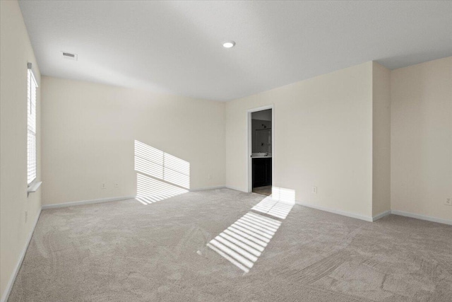view of carpeted spare room