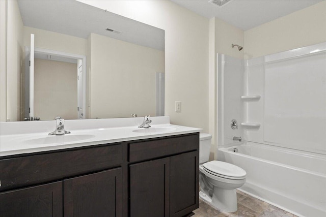 full bathroom featuring vanity, toilet, and shower / bath combination