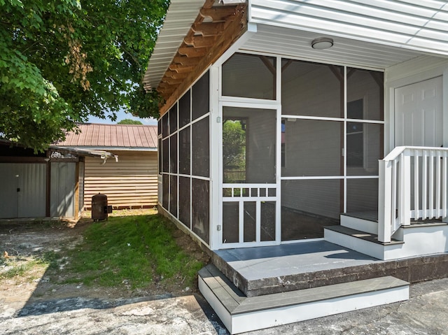 1302 Chestnut St, Kingsport, TN 37664 - view of side of home with a sunroom and metal roof