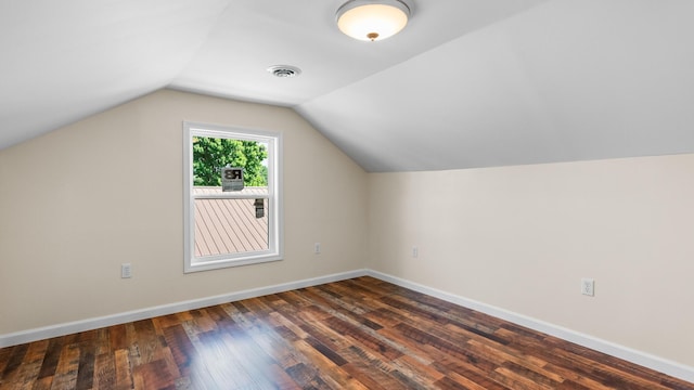 1302 Chestnut St, Kingsport, TN 37664 - bonus room featuring dark wood finished floors, vaulted ceiling, and baseboards