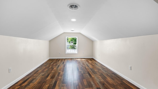 1302 Chestnut St, Kingsport, TN 37664 - additional living space featuring lofted ceiling, baseboards, and dark wood-type flooring