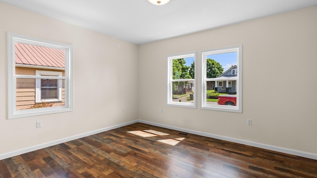 1302 Chestnut St, Kingsport, TN 37664 - spare room with wood-type flooring and baseboards
