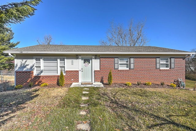 ranch-style house with a front yard