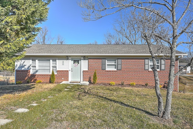 ranch-style home with a front yard