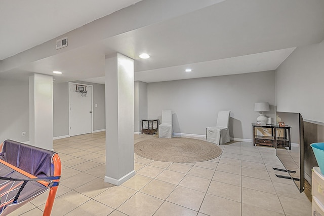 basement with light tile patterned floors