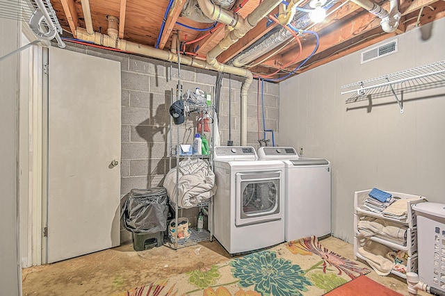 washroom featuring separate washer and dryer