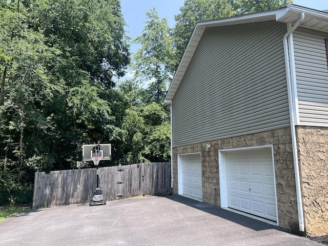 575 Paw Paw Way, Newport, TN 37821 - view of property exterior with an attached garage and driveway