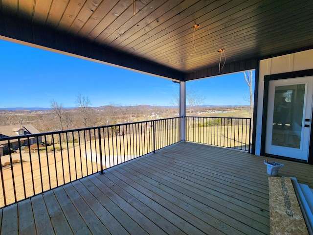 wooden terrace with a mountain view