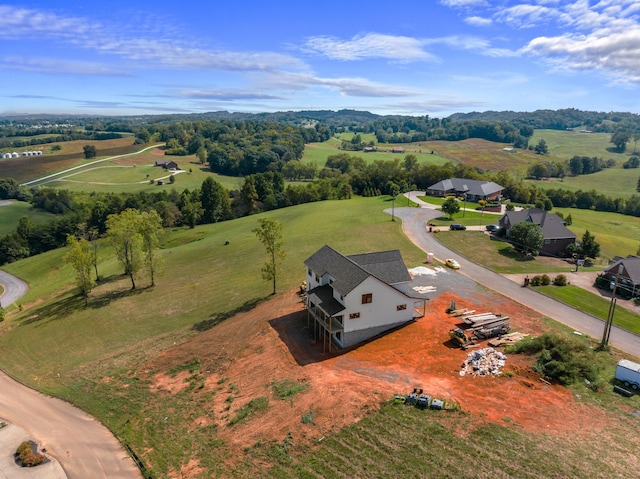 birds eye view of property featuring a rural view