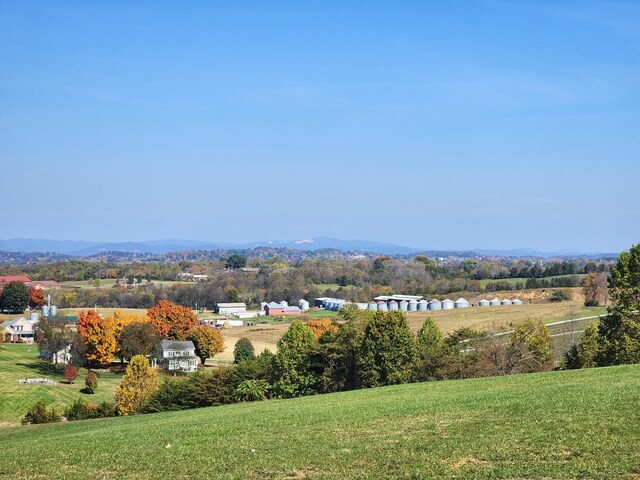 property view of mountains featuring a rural view