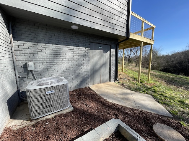 exterior space featuring central air condition unit