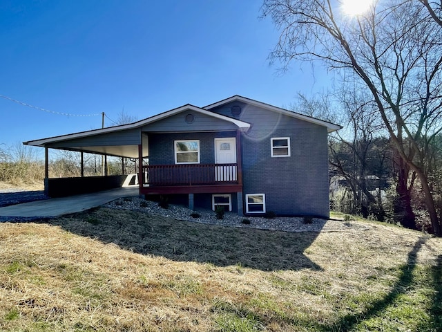 rear view of house with a carport