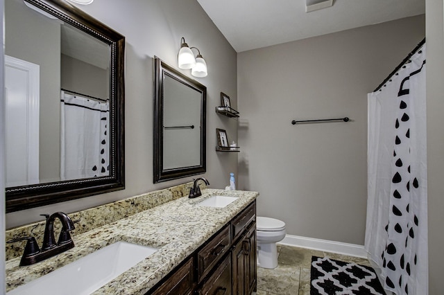 bathroom with a shower with curtain, vanity, and toilet