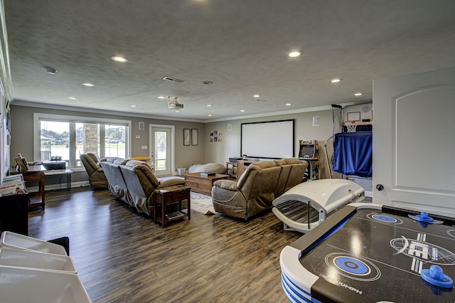 living room with dark hardwood / wood-style flooring and ornamental molding