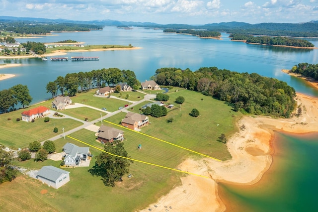 bird's eye view with a water and mountain view