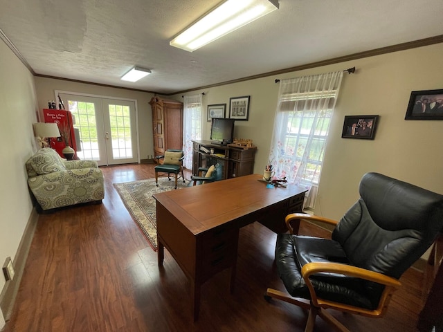 home office with a textured ceiling, ornamental molding, dark wood-type flooring, and french doors