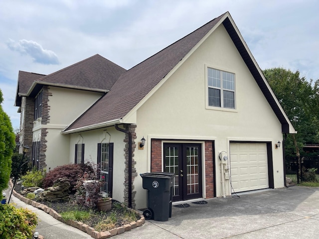 view of property exterior featuring french doors