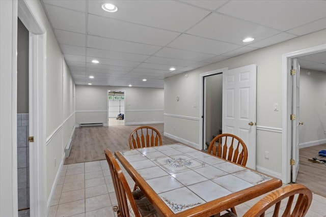 4018 Eagles Nest Dr, Morristown, TN 37813 - dining space featuring recessed lighting, a paneled ceiling, baseboards, and light tile patterned flooring