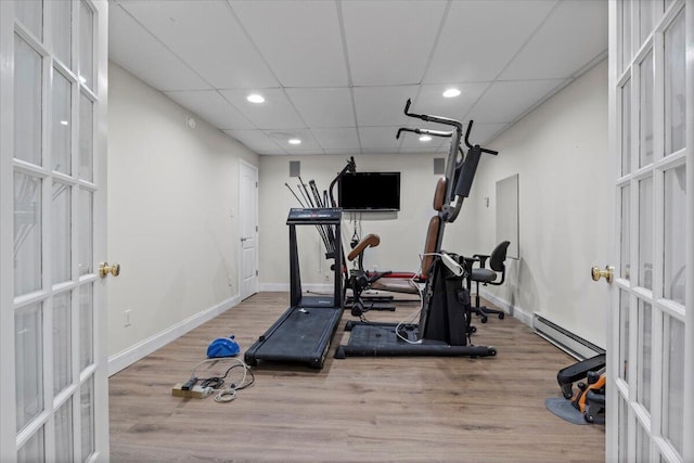 4018 Eagles Nest Dr, Morristown, TN 37813 - exercise area featuring french doors, a baseboard heating unit, recessed lighting, wood finished floors, and baseboards