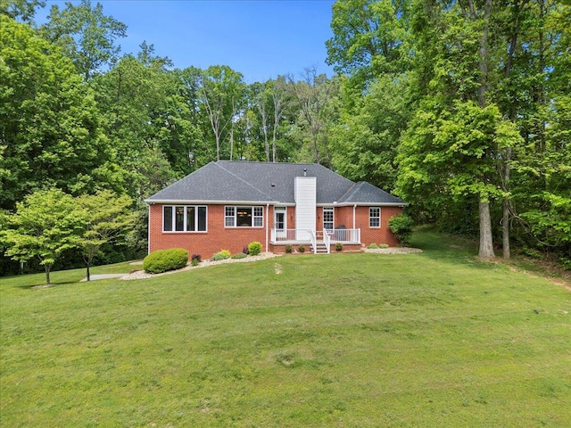 4018 Eagles Nest Dr, Morristown, TN 37813 - ranch-style home featuring brick siding, a front lawn, and a chimney