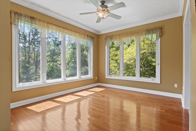 4018 Eagles Nest Dr, Morristown, TN 37813 - spare room featuring baseboards, wood finished floors, crown molding, and a ceiling fan