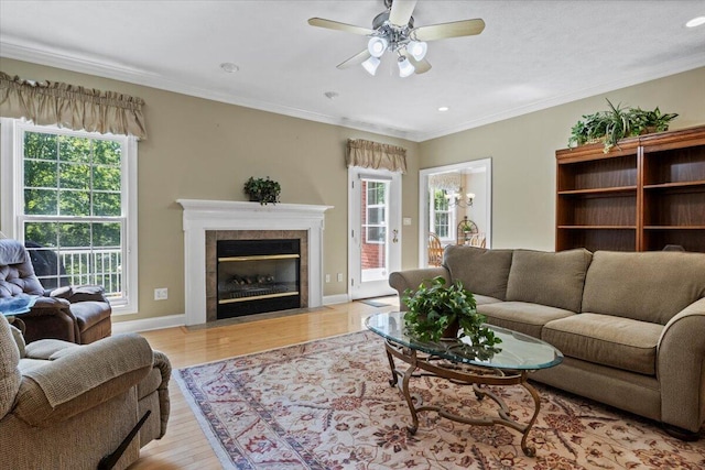 4018 Eagles Nest Dr, Morristown, TN 37813 - living area featuring a ceiling fan, wood finished floors, ornamental molding, baseboards, and recessed lighting