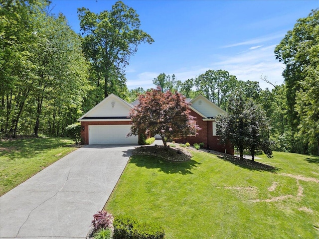 4018 Eagles Nest Dr, Morristown, TN 37813 - view of property hidden behind natural elements featuring a garage, driveway, and a front yard