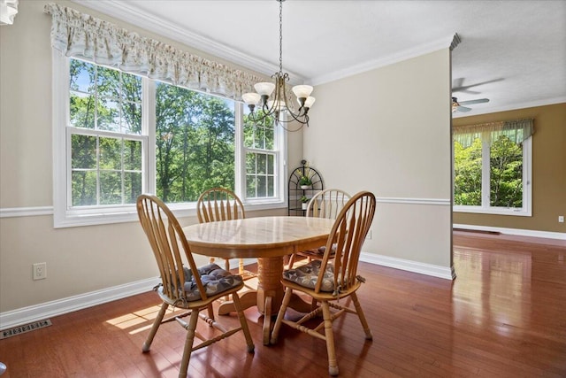 4018 Eagles Nest Dr, Morristown, TN 37813 - dining room featuring ornamental molding, wood finished floors, baseboards, and a chandelier