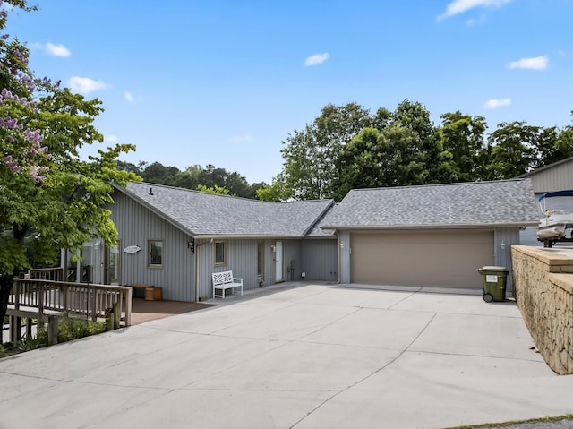 792 Hopper Blf, Rutledge, TN 37861 - view of front of home featuring a garage, driveway, and roof with shingles