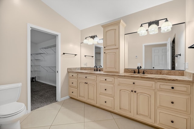 792 Hopper Blf, Rutledge, TN 37861 - full bathroom with double vanity, a spacious closet, tile patterned floors, and vaulted ceiling