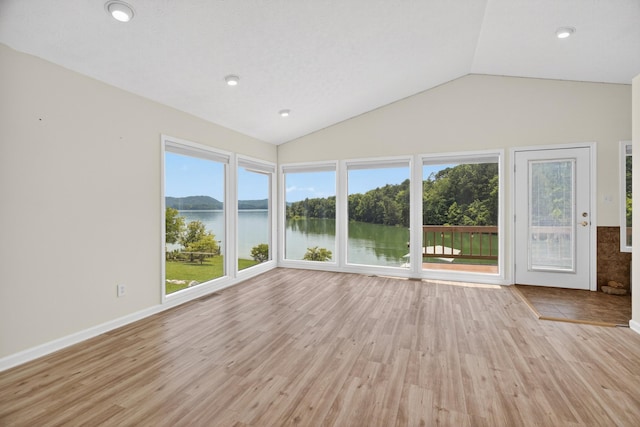 792 Hopper Blf, Rutledge, TN 37861 - unfurnished sunroom featuring lofted ceiling, wood finished floors, a deck with water view, and recessed lighting