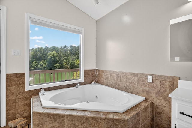792 Hopper Blf, Rutledge, TN 37861 - bathroom featuring a tub with jets, vanity, and lofted ceiling