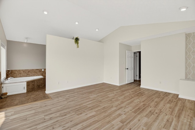 792 Hopper Blf, Rutledge, TN 37861 - unfurnished living room with light wood-style floors and lofted ceiling