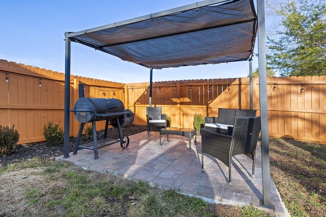 855 Blue Herring Way, Sevierville, TN 37876 - fenced backyard featuring a patio area and area for grilling