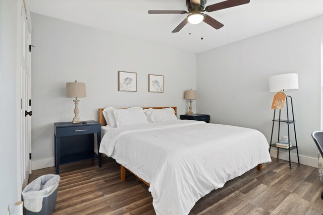 855 Blue Herring Way, Sevierville, TN 37876 - bedroom featuring dark wood-type flooring, ceiling fan, and baseboards