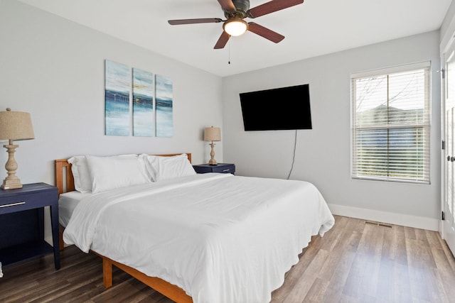 855 Blue Herring Way, Sevierville, TN 37876 - bedroom featuring wood finished floors, baseboards, and a ceiling fan