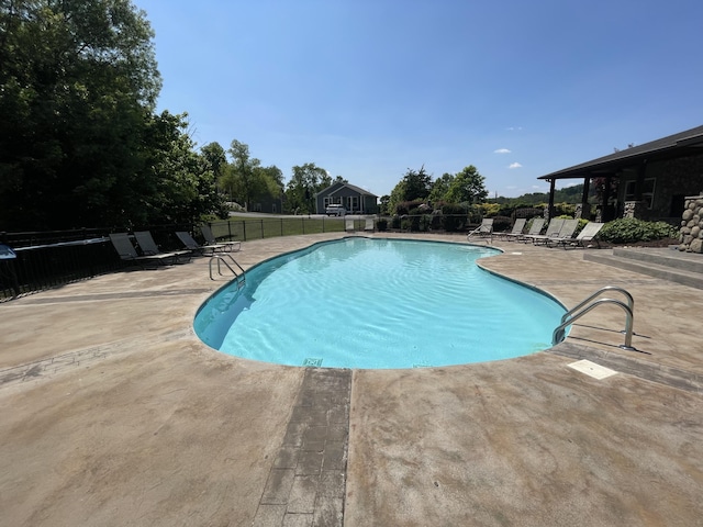 855 Blue Herring Way, Sevierville, TN 37876 - community pool featuring a patio area