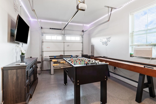 855 Blue Herring Way, Sevierville, TN 37876 - playroom with speckle patterned floor, a garage, and cooling unit