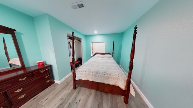 bedroom with light hardwood / wood-style flooring