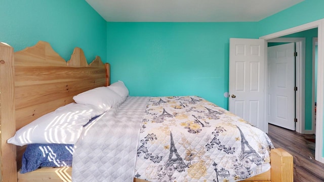 bedroom with hardwood / wood-style flooring