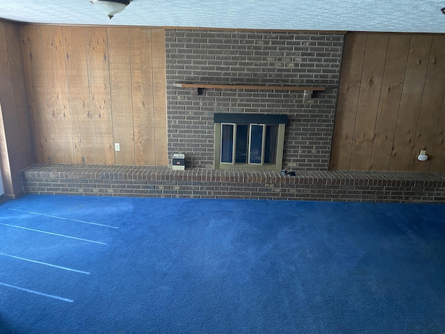 interior space with a brick fireplace