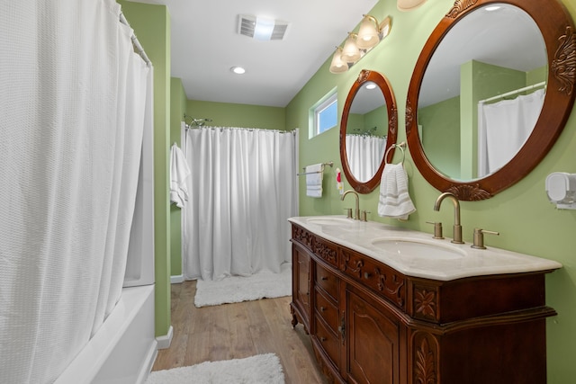 1438 Shannons Little Mtn Rd, Morristown, TN 37814 - bathroom with wood finished floors, double vanity, and recessed lighting