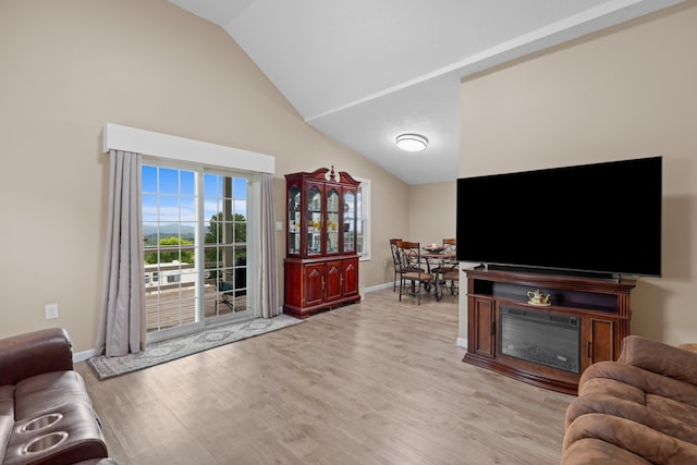 1438 Shannons Little Mtn Rd, Morristown, TN 37814 - living area with light wood finished floors and high vaulted ceiling