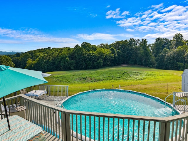 1438 Shannons Little Mtn Rd, Morristown, TN 37814 - swimming pool with a lawn, a shed, and a wooden deck