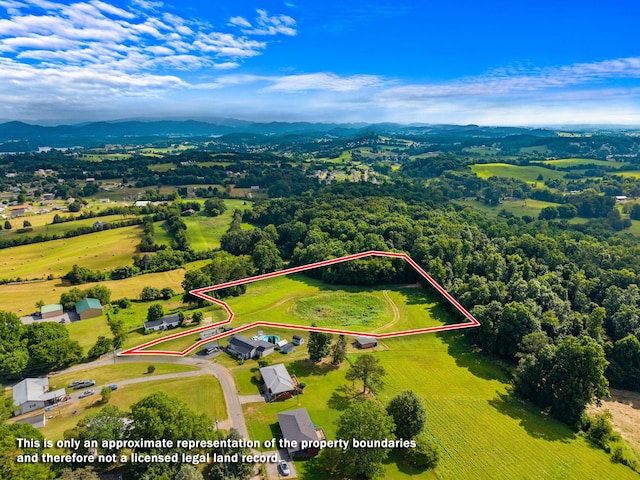 1438 Shannons Little Mtn Rd, Morristown, TN 37814 - aerial view of property and surrounding area featuring property parcel outlined and a mountainous background