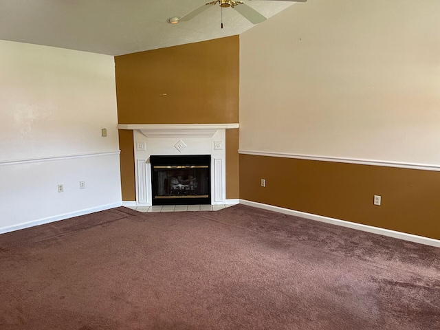 1412 Secreretariat Dr, Morristown, TN 37814 - unfurnished living room featuring carpet, a ceiling fan, a fireplace with flush hearth, baseboards, and lofted ceiling