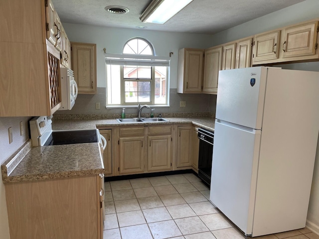 1412 Secreretariat Dr, Morristown, TN 37814 - kitchen with white appliances, light brown cabinets, a sink, and light tile patterned floors