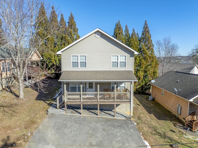 view of front property featuring covered porch