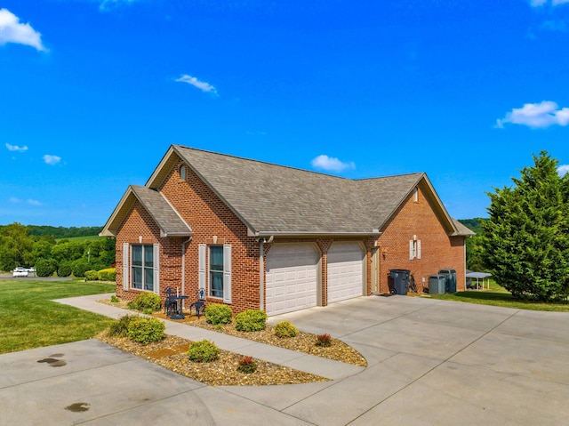 5704 Long Creek Rd, Morristown, TN 37813 - view of property exterior with brick siding, concrete driveway, a garage, roof with shingles, and a lawn