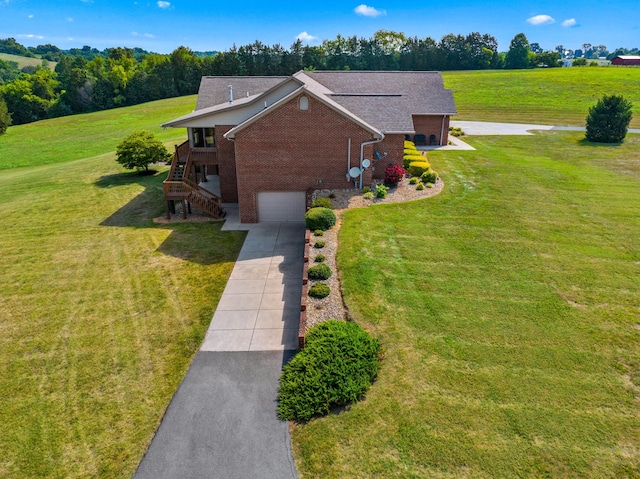 5704 Long Creek Rd, Morristown, TN 37813 - view of front of home featuring stairs, brick siding, driveway, a garage, and a front yard